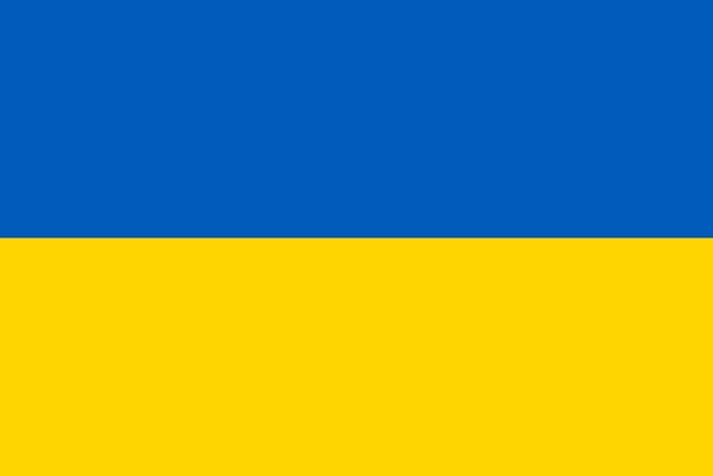A flag featuring two horizontal stripes with blue on the top half and yellow on the bottom half.