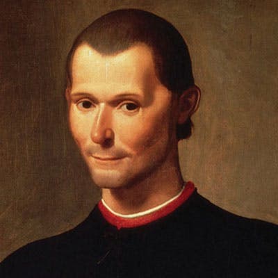 A man with a shaved head, wearing a dark robe with a red and white collar, gazes forward with a slight smile against a plain brown backdrop.
